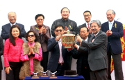 Photos 26, 27, 28<br>
The Hon John Tsang Chun Wah, Financial Secretary of the Hong Kong Special Administration Region, presents the Chinese New Year Cup and yuan bao to Kenneth Lau Ip Keung, owner of winning horse Real Specialist, winning trainer John Size and jockey Joao Moreira.