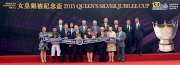 Dr Simon S O Ip, Chairman of the Hong Kong Jockey Club, Stewards, CEO Mr Winfried Engelbrecht-Bresges and the connections of Queen's Silver Jubilee Cup winner Able Friend, smile for the camera at the Queen's Silver Jubilee Cup trophy presentation ceremony. 