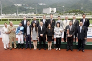 Dr Simon Ip, Chairman of The Hong Kong Jockey Club; Stewards of the Club; Winfried Engelbrecht-Bresges, Chief Executive Officer of the Hong Kong Jockey Club and connections of race winner Not Listenin��tome, smile for the cameras at the Sha Tin Vase presentation ceremony.