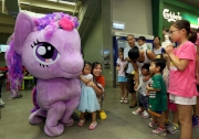Kids take photos with the Giant Little Pony mascot and DIY Little Pony by joining the workshop.