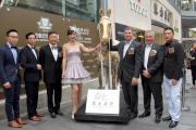All officiating guests pose for a group photo together with the 2015 Oriental Watch Sha Tin Trophy horse statue.  From left, Mr. Anthony Tsang, Mr. Stanley Lam, Mr. Dennis Yeung, Ms. Samantha Ko, Mr. William Nader, Mr Anthony Kelly, Executive Director, Racing Business and Operations of HKJC and Mr. Alain Lam.
