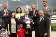 Photo 4, 5, 6<br>
The Hon Sir C K Chow (front row, 1st from right), Steward of the Club, presents the winning trophy and silver dishes to owner Benson Lo Tak Wing, trainer John Size and jockey Joao Moreira of Celebration Cup winner Contentment.
