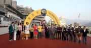 The winning connections of Multivictory celebrate their success after the race.