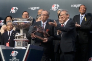 Photo 8, 9, 10, 11<br>
The Hon Lam Woon Kwong (right), Convenor of the Non-official Members of the Executive Council of the HKSAR, presents the LONGINES Hong Kong Cup trophy and a bronze statuette of a horse and jockey to owner representative of A Shin Hikari, trainer Masanori Sakaguchi and jockey Yutaka Take.

