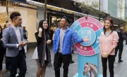 Lucky Stars Louis Cheung and Grace Chan make a special appearance in Causeway Bay and encourage shoppers and passers-by to join on their lucky games.  