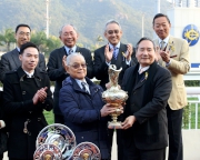 Photos 4, 5, 6<br>
Mr Stephen Ip Shu Kwan, a Steward of the HKJC, presents the Centenary Vase trophy to Leung Lun Ping, winning owner of Secret Weapon, as well as silver dishes to trainer Dennis Yip and jockey Douglas Whyte.
