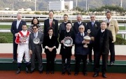 HKJC Stewards, Chief Executive Officer Winfried Engelbrecht-Bresges and winning connections of Secret Weapon take a group photo at the presentation ceremony of the Centenary Vase.
