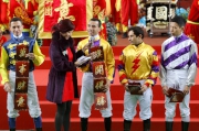 Jockeys greet fans in the Parade Ring at the opening ceremony and wish them good fortune and prosperity in the New Year.