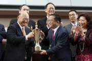Photo 8, 9, 10<br>
At the AP QEII Cup trophy presentation ceremony, the Hon Chief Justice Geoffrey Ma Tao Li (left), the Chief Justice of the Court of Final Appeal of the HKSAR and a Voting Member of the Club, presents the winning trophy and bronze statuettes to Johnson Chen, owner of AP QEII Cup winner Werther; trainer John Moore and jockey Hugh Bowman.
