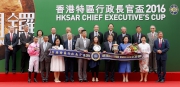 Mrs Leung, the wife of the Chief Executive of the HKSAR, the Hon Mrs Carrie Lam, Chief Secretary for Administration of the HKSAR, Club Chairman Dr Simon Ip, Club Stewards, CEO Winfried Engelbrecht-Bresges, and connections of HKSAR Chief Executive��s Cup winner Lucky Year, smile for the cameras at the presentation ceremony.