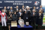 Photo 5, 6, 7<br>
Club Steward Lester Kwok presents the LONGINES Jockey Club Cup trophy and silver dishes to the owner of Secret Weapon, Leung Lun Ping , trainer Dennis Yip  and jockey Nash Rawiller.
