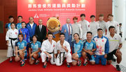 The Cluba?s Chief Executive Officer Winfried Engelbrecht-Bresges (back row, centre), Secretary for Home Affairs Lau Kong-wah (back row, 4th left) and Chairman of the HKSI Dr Lam Tai-fai (back row, 3rd left), with Captain JC from the Progressing Together Cheering Team (back row, 5th left) and athletes at the presentation ceremony for the Jockey Club Athlete Incentive Awards Scheme.